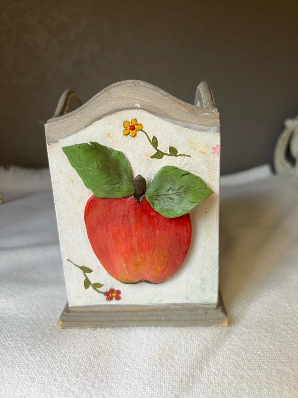 Vintage rustic wooden kitchen organizer featuring a hand-painted fruit and flora